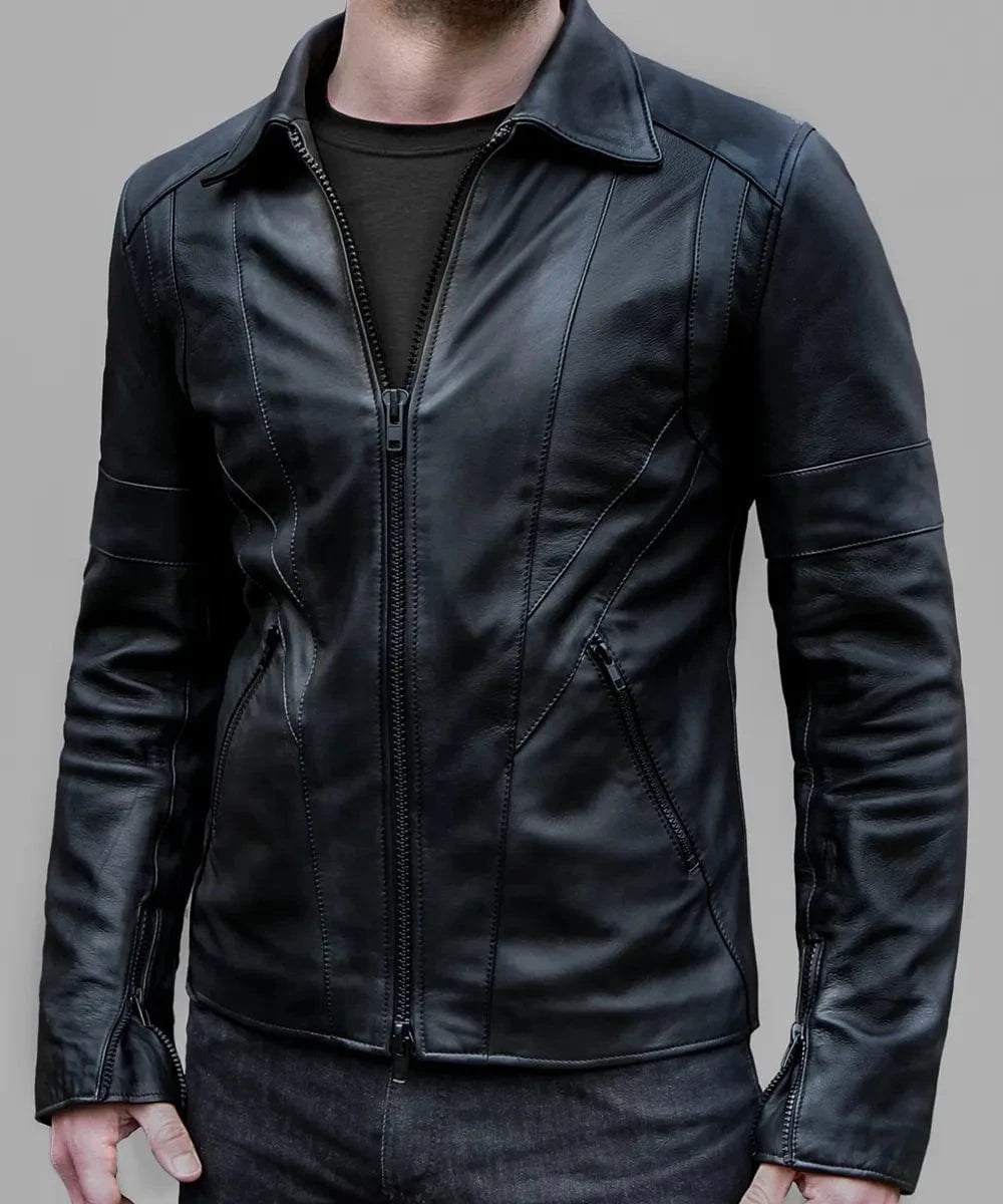 Model wearing vintage black leather jacket with slim fit styling and zip front design