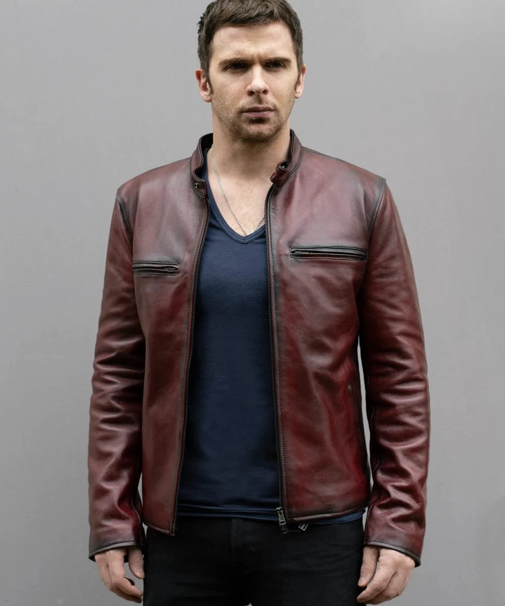 Model wearing red cafe racer leather jacket with zip front and slim fit silhouette