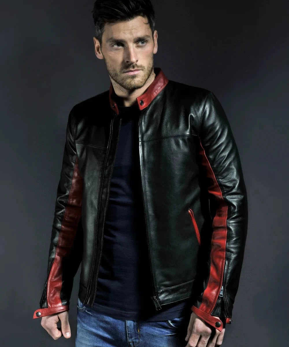 Model wearing black Crusader modern slim fit leather jacket with red sleeve panels and zip front style