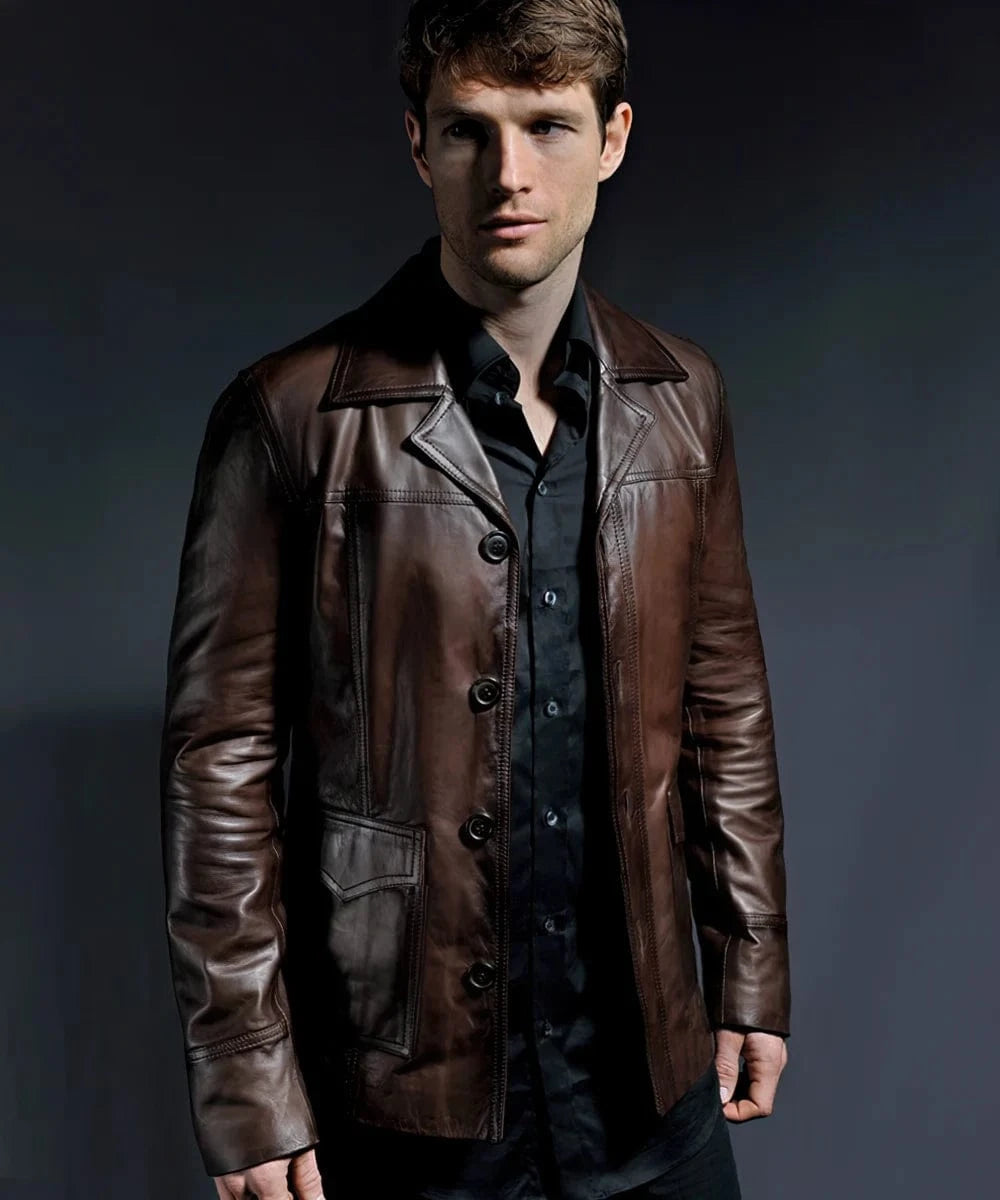 Model wearing vintage slim fit brown leather jacket with retro button front styling and classic 70s inspired lapels