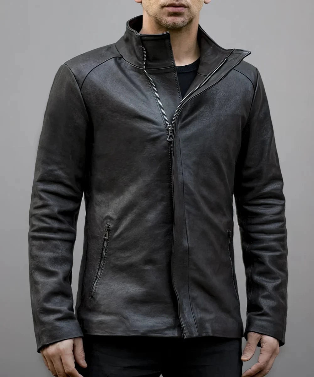 Male model wearing a grey leather slim fit jacket with high funnel collar, concealed asymmetric zip front, and minimalist futuristic styling