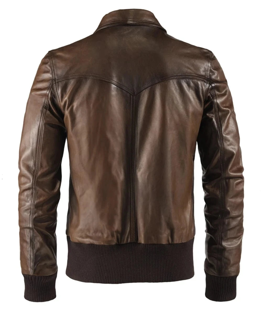 Back view of vintage brown leather bomber jacket with slim fit styling and ribbed knit trim