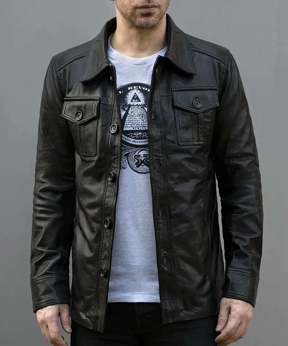 Model wearing vintage black leather shirt jacket with slim fit styling and classic button front design