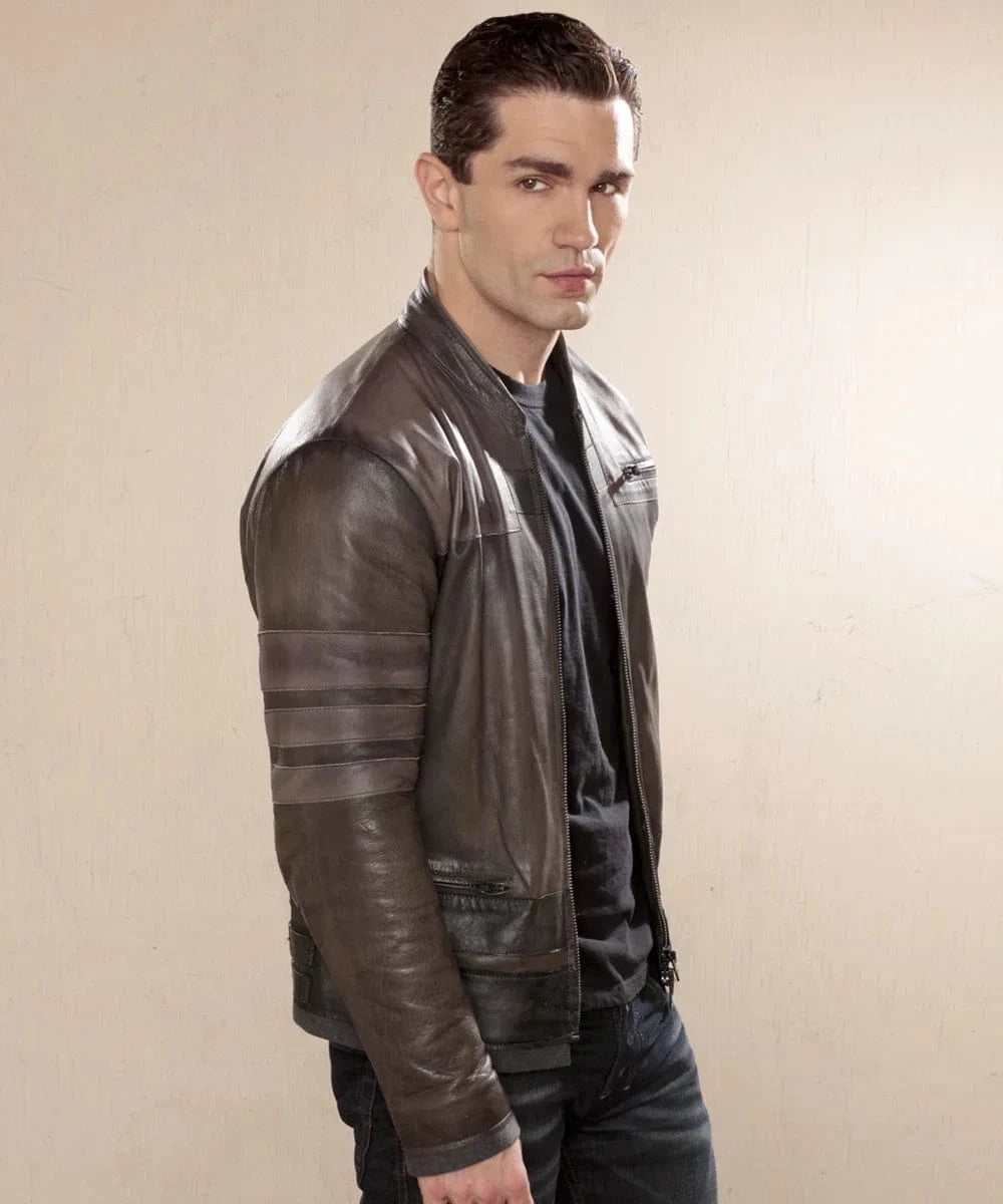 Sam Witwer as Starkiller wearing grey leather jacket with slim fit sci fi styling and contrast sleeve panel detailing