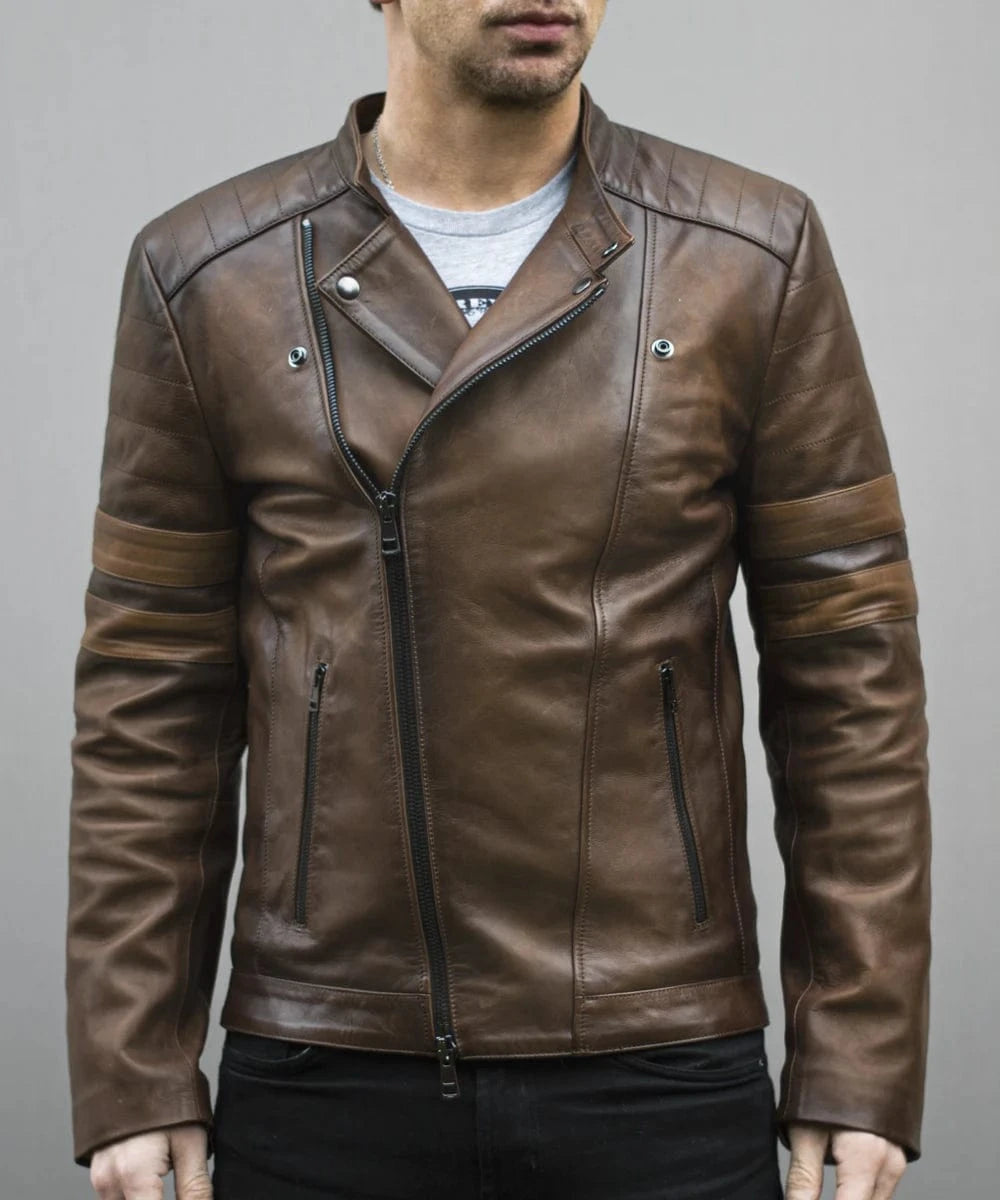 Male model wearing a brown leather slim fit biker jacket with asymmetric zip front, quilted shoulders, double sleeve stripes, and cafe racer styling