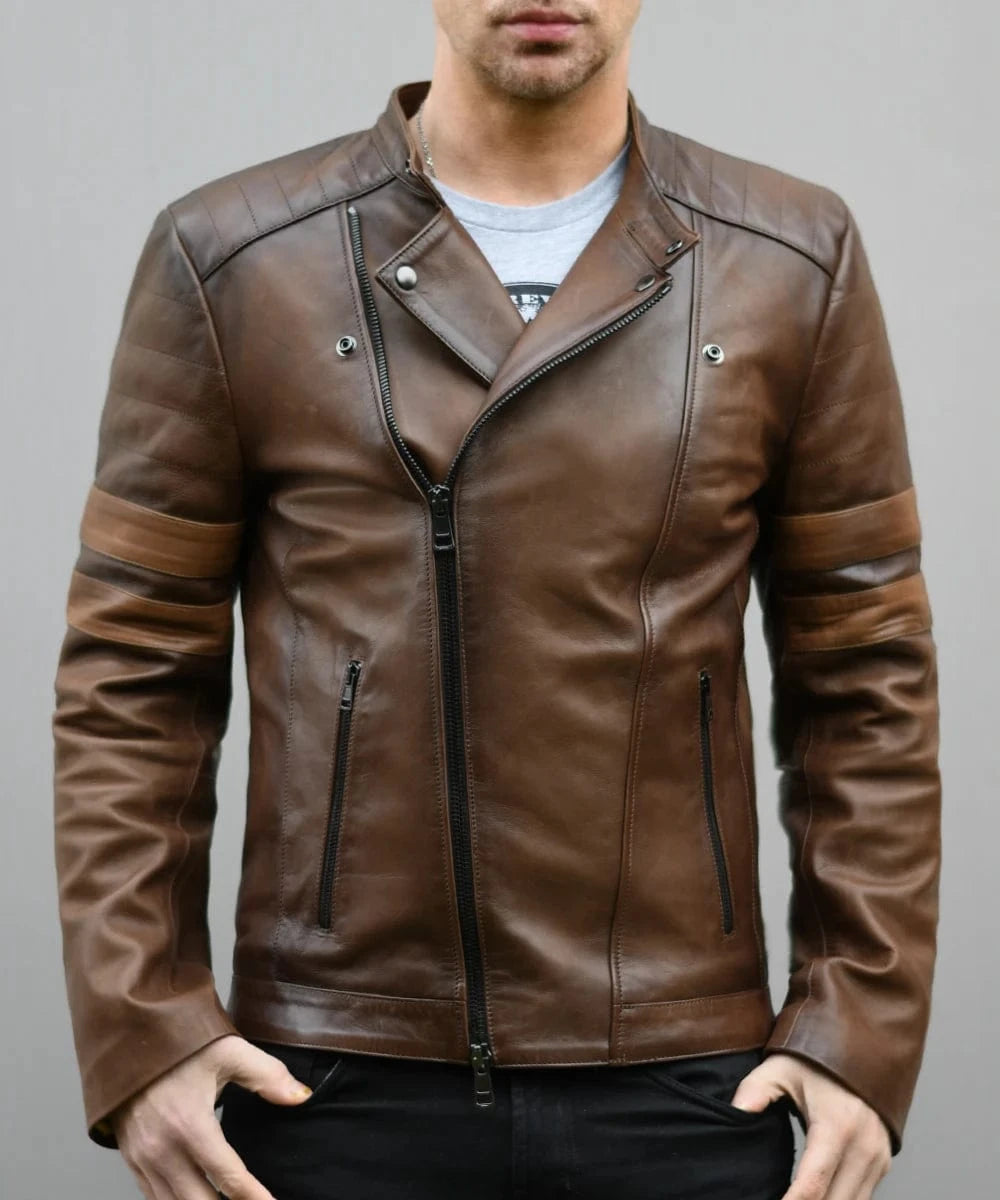 Male model wearing a brown leather slim fit biker jacket with asymmetric zip front, double sleeve stripes, and cafe racer styling