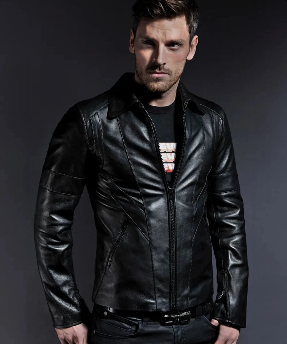 Model wearing vintage black leather jacket with slim fit styling and zip front design