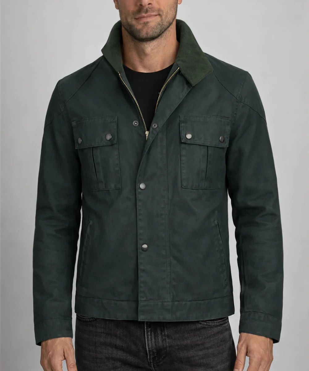 Model wearing vintage green cotton jacket with slim fit styling and popper button front design